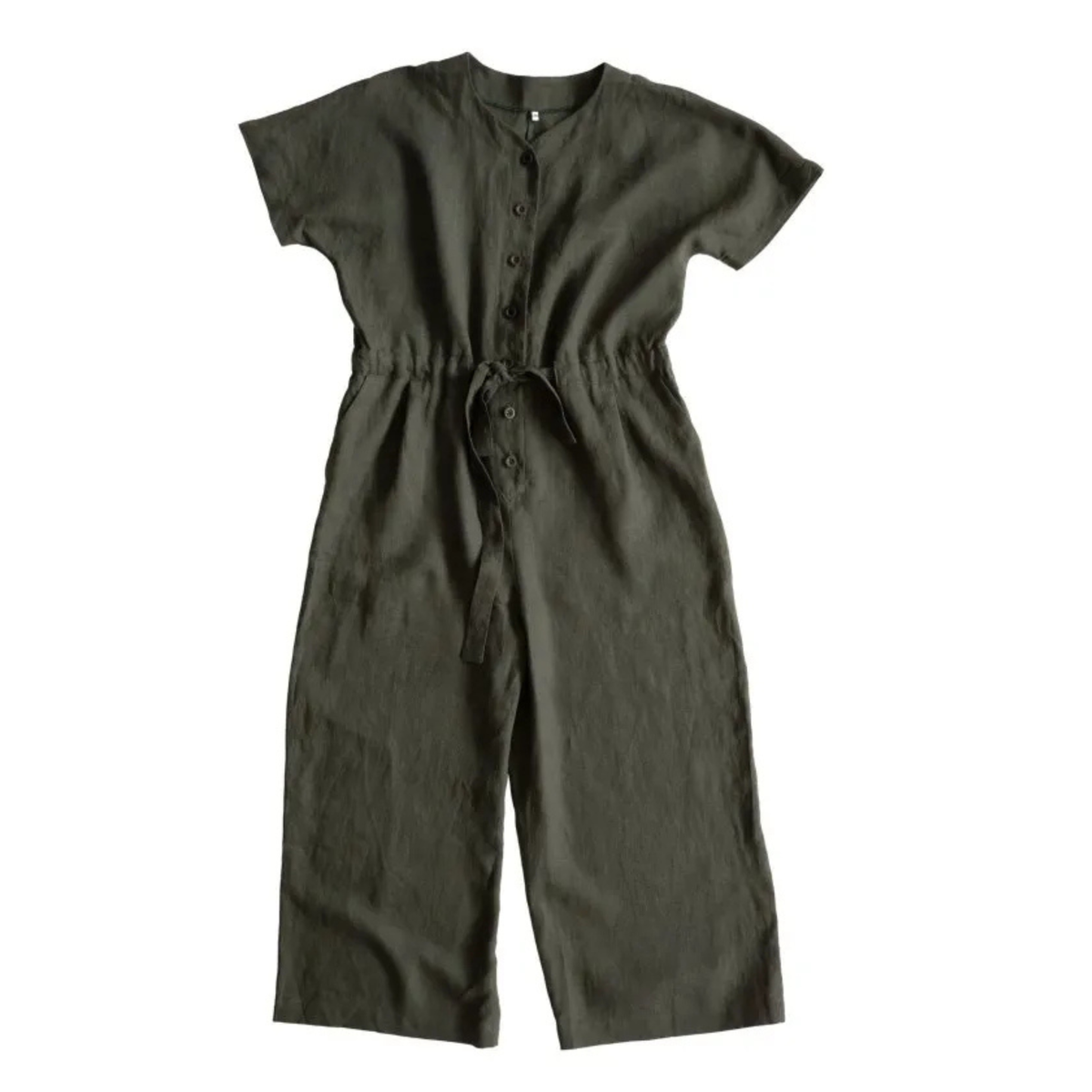 Green cassidy jumpsuit by Merchant and Mills on a white background