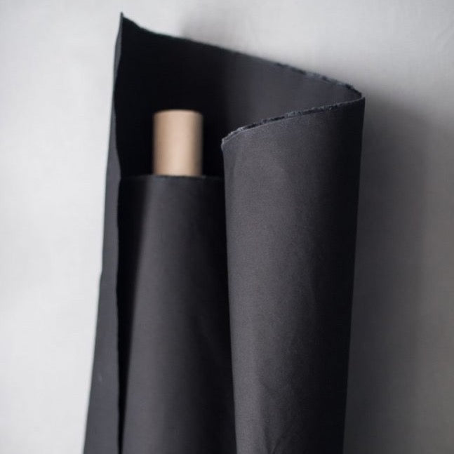 Organic Cotton Dry Oilskin in Black | Merchant & Mills designer sewing fabric | Stitch Piece Loop | Online Fabric & Sewing Supplies | A carefully curated range focusing on ethically produced & sustainable fabrics of the highest quality, perfect for the modern & considered sewist’s memade wardrobe | Australia