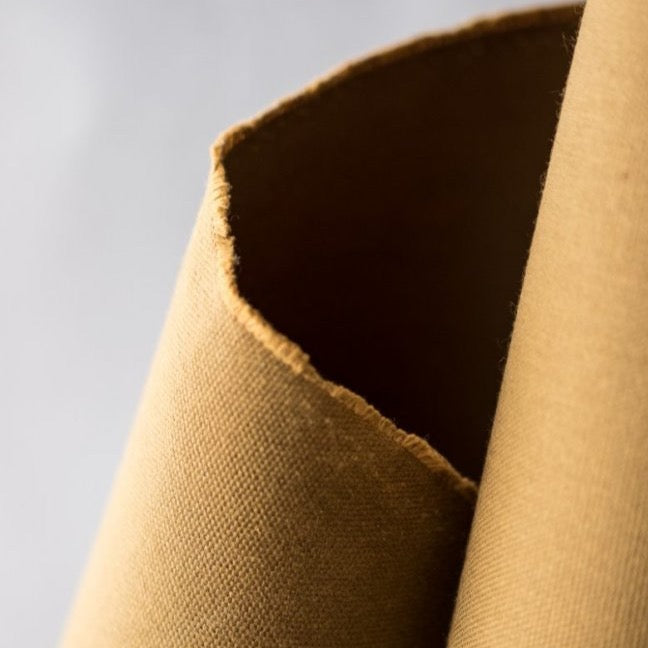 Expedition Dry Oilskin in Tan | Merchant & Mills designer sewing fabric | Stitch Piece Loop | Online Fabric & Sewing Supplies | A carefully curated range focusing on ethically produced & sustainable fabrics of the highest quality, perfect for the modern & considered sewist’s memade wardrobe | Australia
