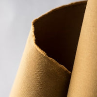 Expedition Dry Oilskin in Tan | Merchant & Mills designer sewing fabric | Stitch Piece Loop | Online Fabric & Sewing Supplies | A carefully curated range focusing on ethically produced & sustainable fabrics of the highest quality, perfect for the modern & considered sewist’s memade wardrobe | Australia
