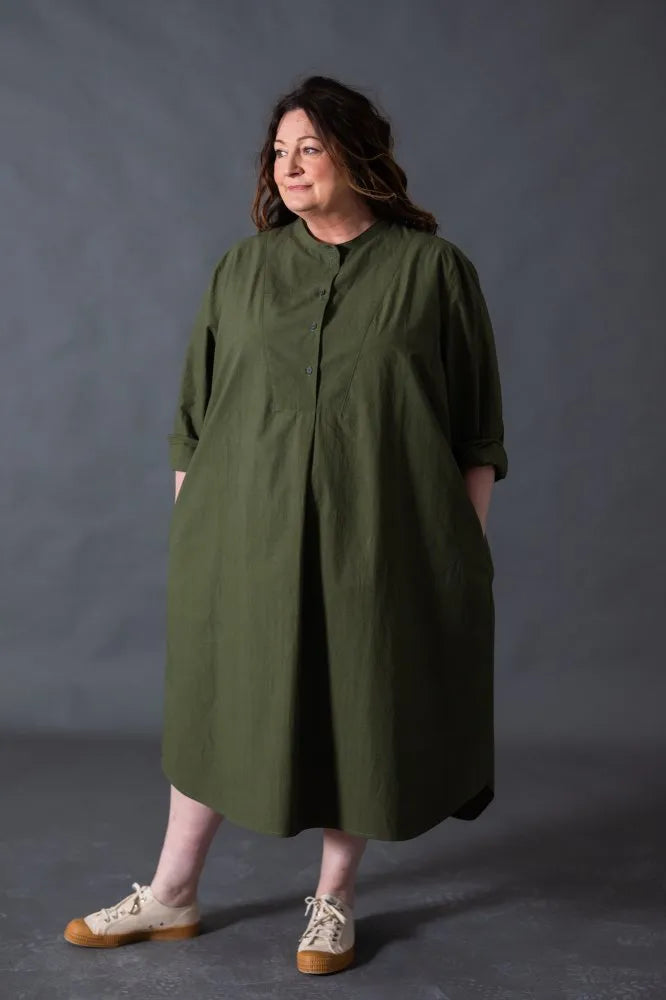 Woman wearing a dark green Niven Shirt Dress. The Niven Shirt Dress Sewing Pattern by Merchant and Mills available at Stitch Piece Loop Australia.