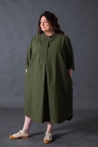 Woman wearing a dark green Niven Shirt Dress. The Niven Shirt Dress Sewing Pattern by Merchant and Mills available at Stitch Piece Loop Australia.