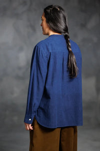 Woman wearing a dark blue Niven Shirt Dress - top version. The Niven Shirt Dress Sewing Pattern by Merchant and Mills available at Stitch Piece Loop Australia.